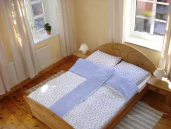 Schlafzimmer Dielenboden Kachelofen